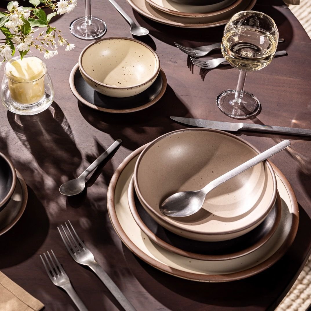 gardengox daily bowl in Warm Taupe, in a table setting with other dinnerware